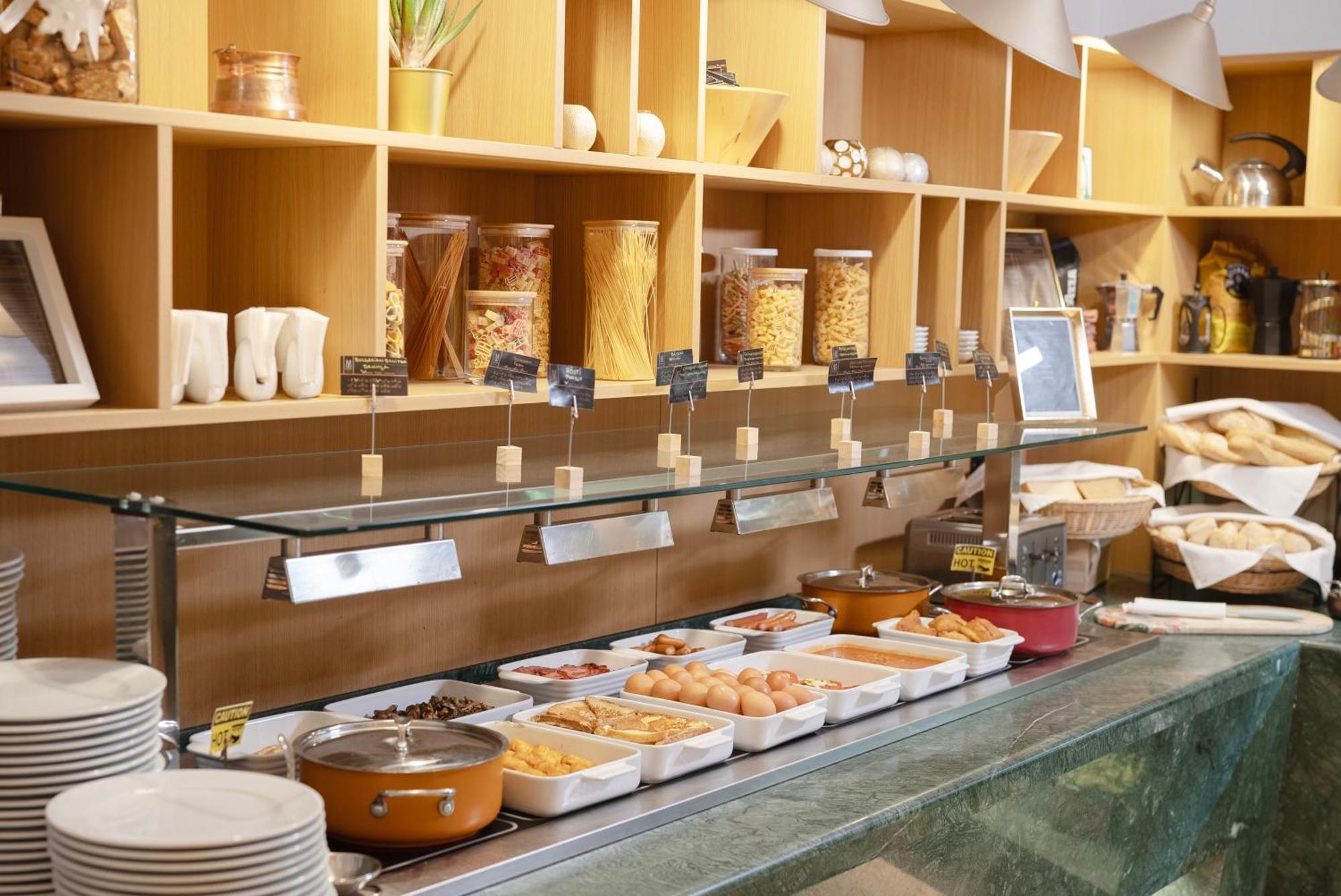 Maison Sofia - Mgallery Exteriör bild A buffet at a hotel